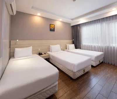 Deluxe Triple Room — Viet Lotus Saigon Hotel